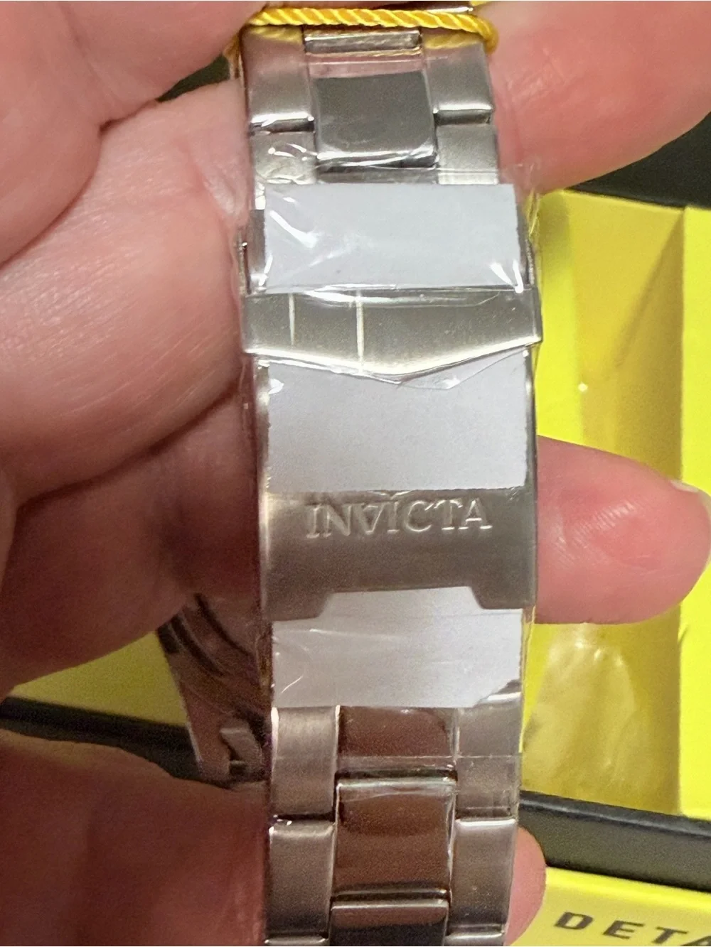 Invicta Pro Diver series stainless steel watch featuring a striking red dial